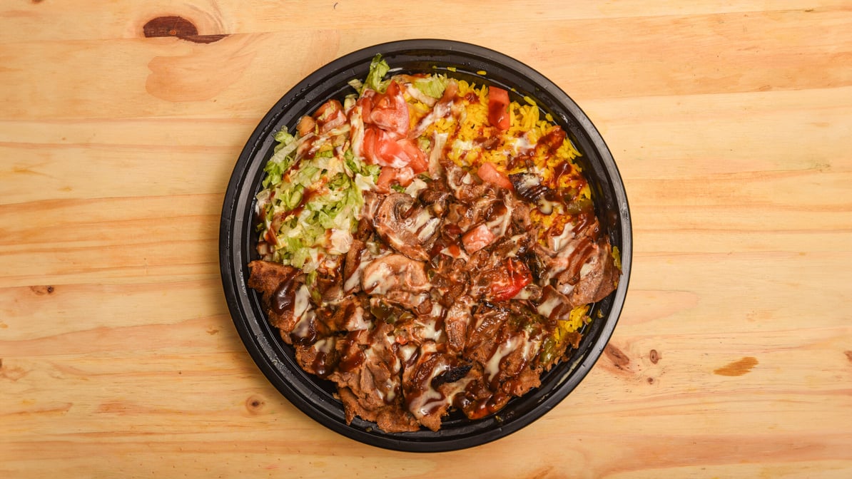 Ribeye steak bowl with peppers and mushrooms